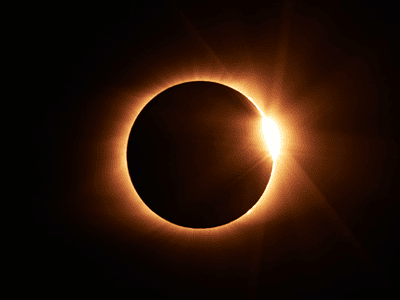 stockphoto of the moon passing in front of the sun in a solar eclipse