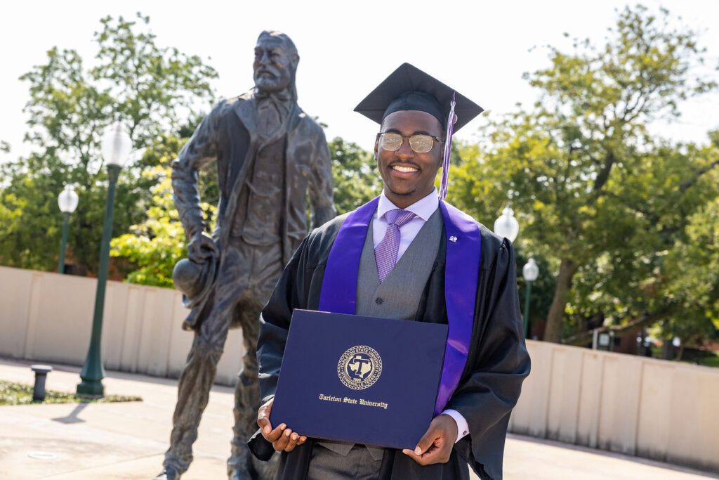 Graduate at Tarleton Statue